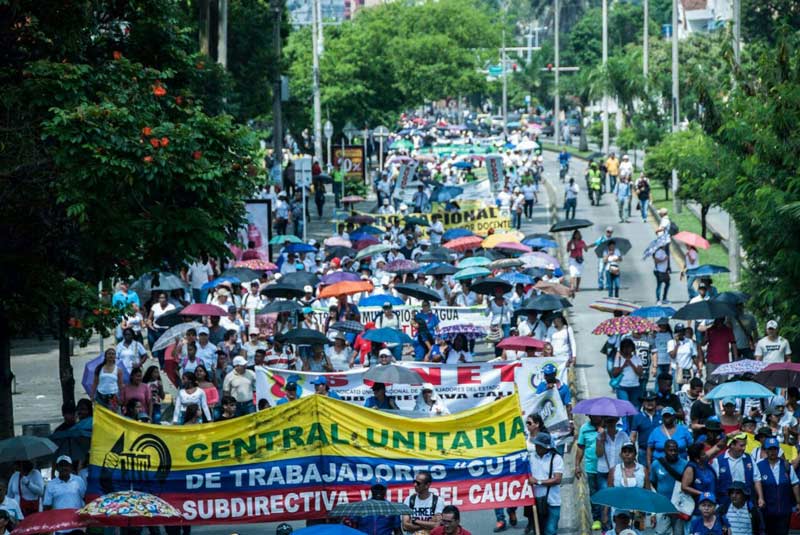 Centrales obreras mantienen convocatoria de paro pese a pico de contagios