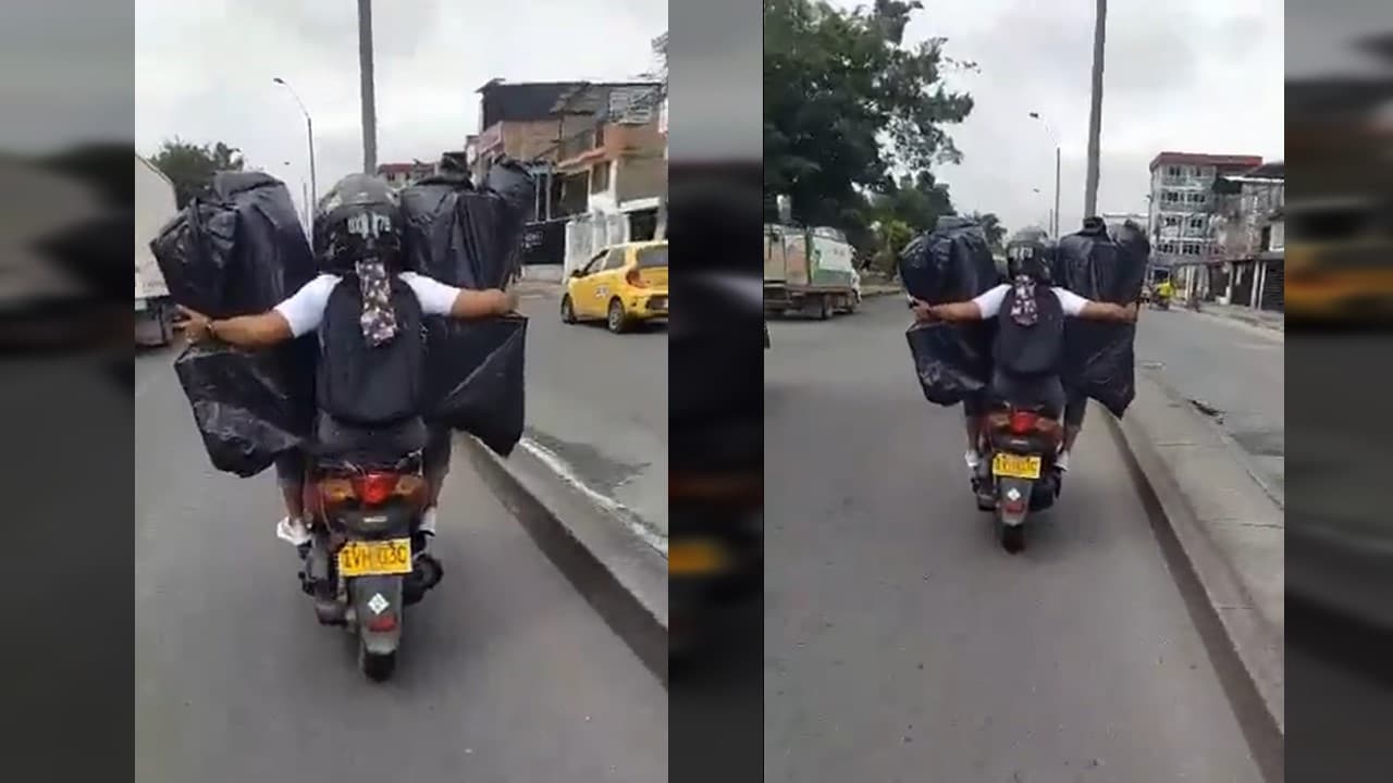 "¿Me lleva algo más?": Motociclista estaría llevando un 'trasteo' en Cali